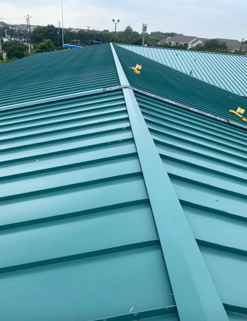 Green commercial metal roof ridge and valley for Metal Roof Repair in Inglewood
