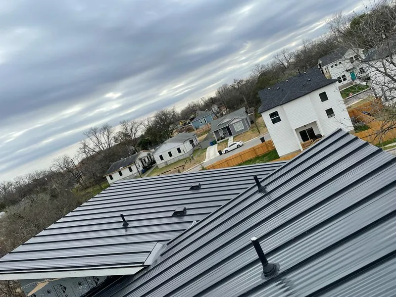 Standing seam metal roof panels with vents for Skylight Repair in Inglewood